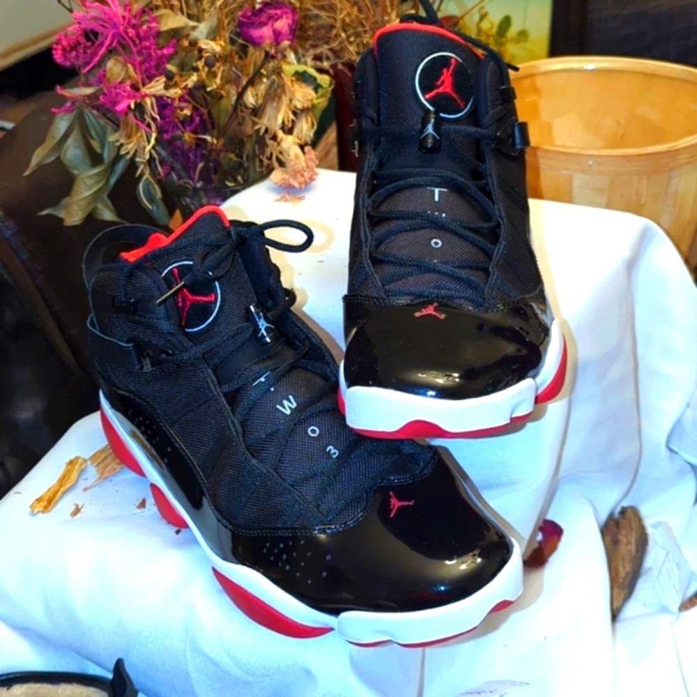 AirJordan 6 rings black patent leather on white.